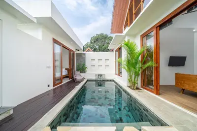 an indoor swimming pool in the middle of a house at A26 - Private Pool Villa in Seminyak in Seminyak