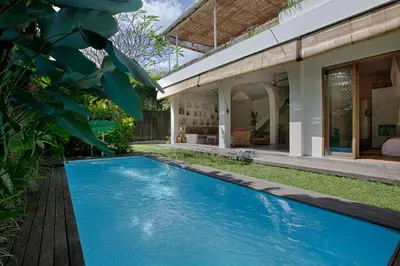 an image of a swimming pool in front of a house at Villa Inde Noi - Beautiful stylish bohemian 2bdrs villa - Kerobokan in Kerobokan