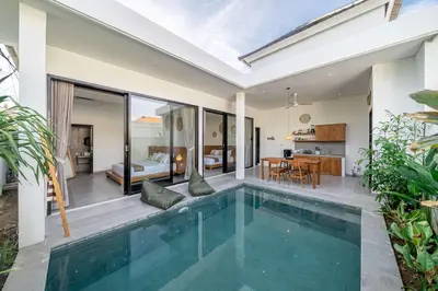 a swimming pool in a villa with a bedroom at Peaceful 2BR Pool Villa in Kerobokan - V2 in Kerobokan