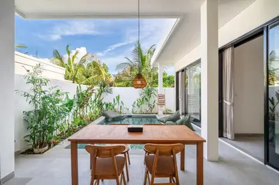 a dining room with a table and chairs at Peaceful 2BR Pool Villa in Kerobokan - V2 in Kerobokan