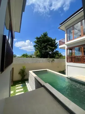 a swimming pool in the backyard of a house at SummerVille Nusa Dua by REJA Villas in Nusa Dua