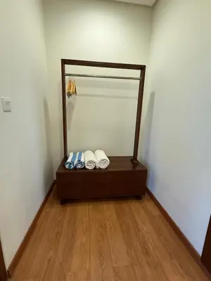 a room with a mirror and three pairs of shoes at Avela bali villa in Kerobokan
