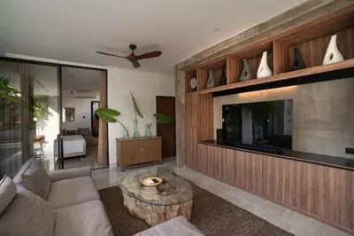 a living room with a couch and a coffee table at Deo Villa Seminyak in Seminyak