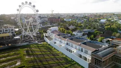 an aerial view of a city with a ferris wheel at Villa Isabella 4BR Brand New in Berawa, Canggu in Canggu