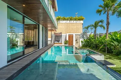 an image of a swimming pool in a house at Bedawang, Exquisite Seminyak 4BR Villa with Huge Pool in Seminyak