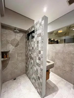 a bathroom with a shower and a sink at Cozy villa 777 near canggu 3BR in Kerobokan