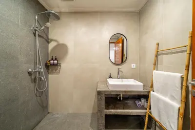 a bathroom with a sink and a shower at Nyma 2BR Villa Seminyak in Seminyak
