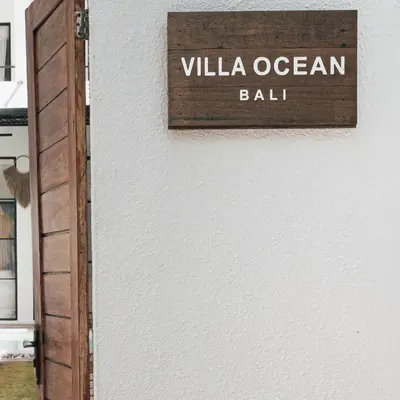 a sign that reads villa ocean ball on a wall at Villa Ocean Bali in Seminyak