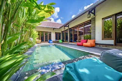 an image of a swimming pool in a villa at Seminyak Happy Villa in Legian