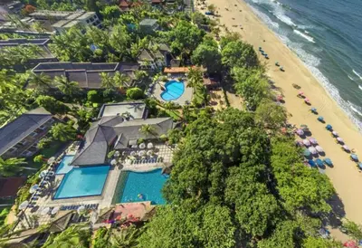 an aerial view of a resort with a beach at Apartment at Jayakarta Residence Beach Front Access in Seminyak