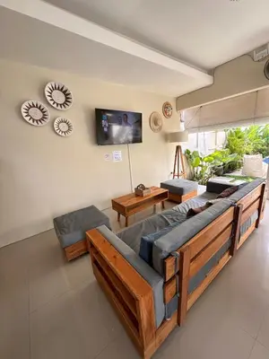 a living room with a couch and a tv at Villa Majegau 3, 3 bedrooms, Seminyak center in Seminyak