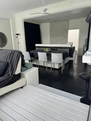 a living room with a table and a dining room at Villa with 2 Bedrooms & Private Bathrooms near to the beach Seminyak in Seminyak