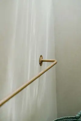 a metal hand rail on a white wall at Villa Madame 3BR Villa Private Pool in Berawa in Canggu