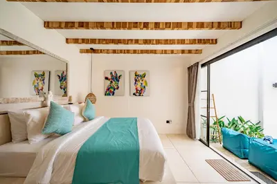 a bedroom with a bed and a large window at Soft Opening! Villa Lumière 1 Seminyak in Seminyak