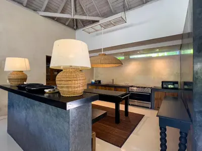 a kitchen with two lamps on a counter at Luxurious 5Br Retreat in Umalas in Canggu