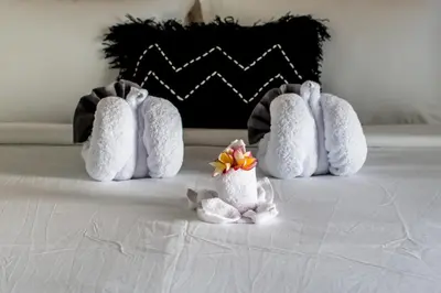 a group of four stuffed animals on a bed at Villa Sakura III Seminyak in Seminyak