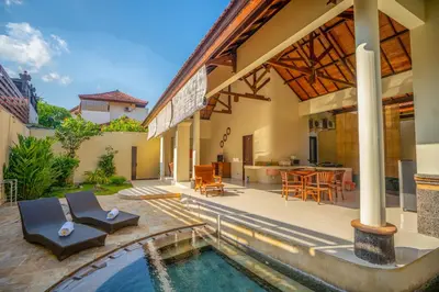 an image of a backyard with a swimming pool and a house at Villa PBC 2 Bed Room Private Pool in Seminyak in Seminyak