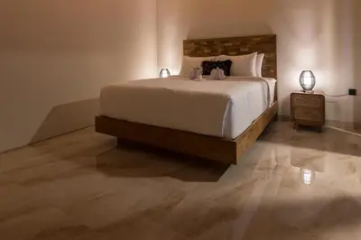 a bedroom with a large bed in a room at Villa Sakura ll seminyak in Seminyak