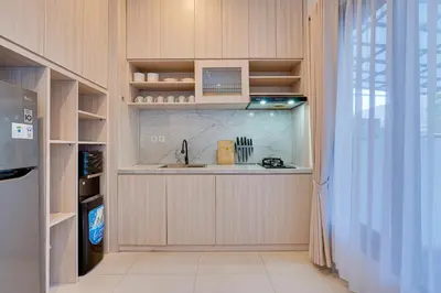 a kitchen with a counter and a sink in a room at Stylish 2BR Villa Taman Seminyak 52 near Beach in Seminyak