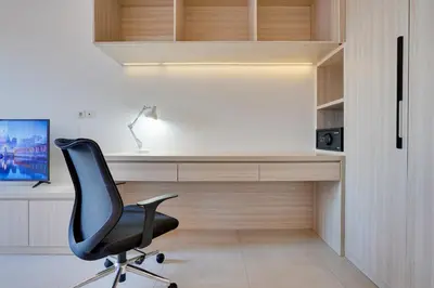 an office with a black chair and a desk at Stylish 2BR Villa Taman Seminyak 52 near Beach in Seminyak