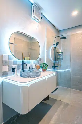 a bathroom with a sink and a mirror at Amshiga 1 in Jimbaran
