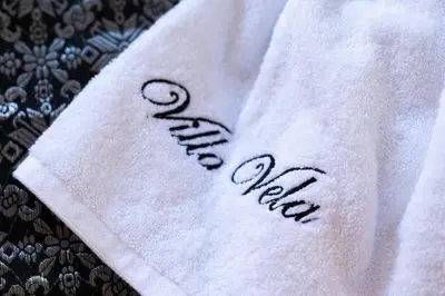 a napkin with the word romance written on it at Villa Vela 1 - Brand new 3 bedroom villa in Seminyak