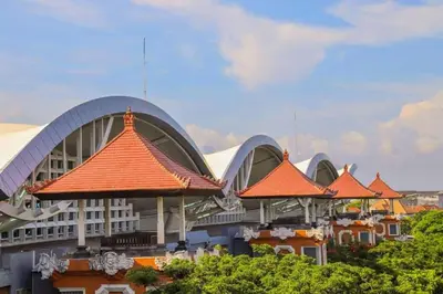 a building with orange roofs in front at RBE Hotel Kuta 4- 5 Min to Airport&Beach by Micky Studio in Ngurah Rai International Airport