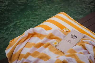 an orange and white towel with a price tag on it at Villa Toku by BaliSuperHost in Seminyak