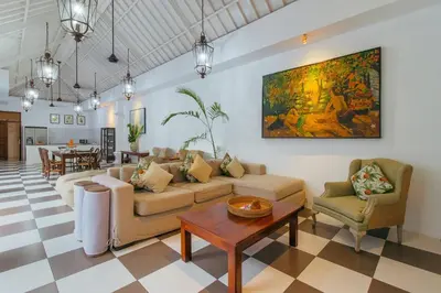 a living room with a couch and chairs and a table at Private 2 Br Pool Villa, 400m to Beach, Sleeps 4 in Seminyak