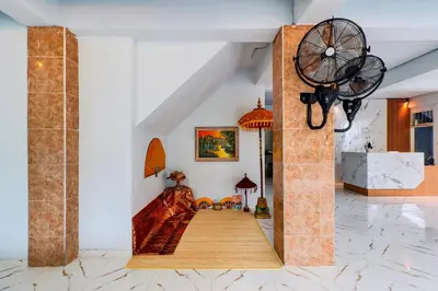 a hallway with a staircase in a room at Townhouse Oak @lebak Bene Near Kuta Beach in Balian