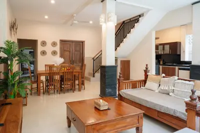 a living room with a couch and a table at New Villa 50 Seminyak in Seminyak