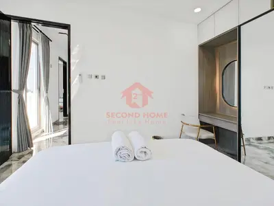 a bedroom with a bed with two towels on it at Luxury 3BR Krobokan Villa B Pool&Wi-Fi in Kerobokan