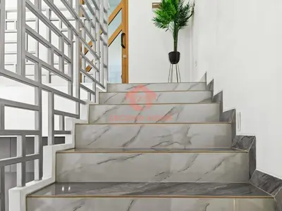 a concrete staircase with a potted plant on it at Luxury 3BR Krobokan Villa B Pool&Wi-Fi in Kerobokan