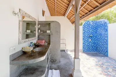 a bathroom with a sink and a mirror at Five Star Reviews, Airbnb Plus, Awesome Location in Seminyak