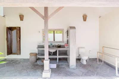 a bathroom with a sink and a toilet at Five Star Reviews, Airbnb Plus, Awesome Location in Seminyak