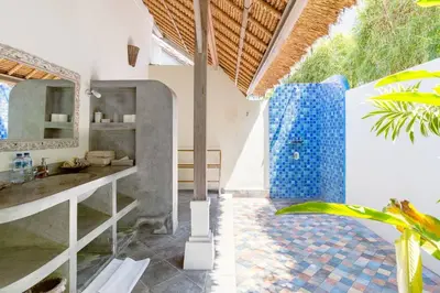 a bathroom with a shower and a sink at Five Star Reviews, Airbnb Plus, Awesome Location in Seminyak
