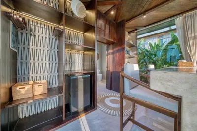 a home office with wooden walls and a large window at New Sleek 1BR Retreat with Pool Near Seminyak in Kerobokan