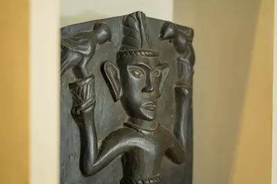 a bronze statue of a woman holding a fish at Anam Khaya - Brand New Villa, Walk to Seminyak Beach in Seminyak