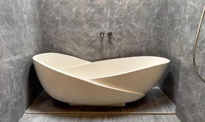 a white bath tub sitting in a bathroom at Chic Villa at Kubu Taullan 3B in Kerobokan
