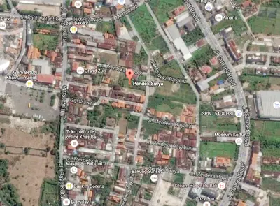 a map of a city with a red marker at Pondok Sutya in Kuta