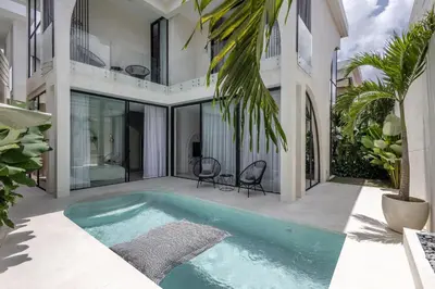 a swimming pool in the backyard of a house at Brand New Luxury Design Villa by Amare Villas 4 in Badung