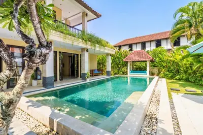 an image of a swimming pool in front of a house at Aileen 4 BR Private Pool Villa in Seminyak