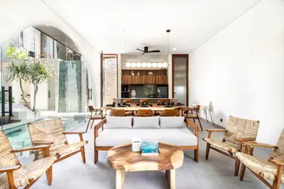 a living room with a couch and chairs at Villa Lalalax 3BR Tropical Retreat in Jimbaran in Uluwatu