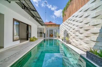 an image of a swimming pool in a house at Rumah Bella Private Villa 3 Bedroom 3 Bathroom in Jimbaran