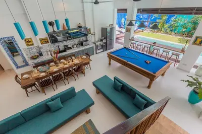 an overhead view of a living room with a pool table at Villa Kanari,5 bed & pool in Seminyak