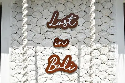 a cake with the words lost in balls on it at Casa Veluna - Seminyak in Seminyak