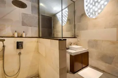 a bathroom with a sink and a shower at Sayara Modern 3 BR Private Pool Villa in Seminyak