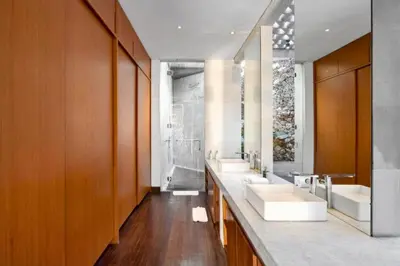 a bathroom with three sinks and a row of mirrors at Sayara Modern 3 BR Private Pool Villa in Seminyak