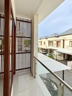 an open balcony with a view of a building at Casa Danasa, secure and serene Villa at the heart of Seminyak with 24hr One Gate Security in Seminyak