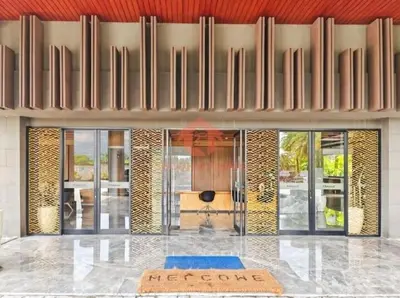 a lobby of a building with a desk in it at Newly Lavaya Resort 1BR with pool in Nusa Dua